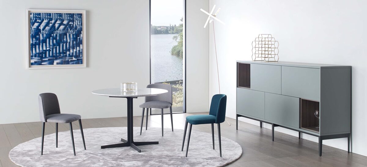 Modern dining table with refined craftsmanship and sleek design by Camerich.