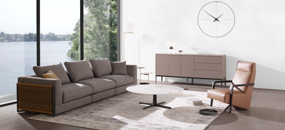 Minimalist lounge chair with low profile and smooth lines by Camerich.