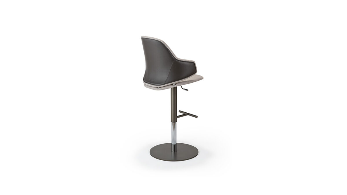 Luxury Vela Sgabello bar stool by Reflex Angelo in Royal Oak, MI – with a resin and wood shell, upholstered in leather or fabric, quilted backrest, and a height-adjustable metal base in titanium finish.