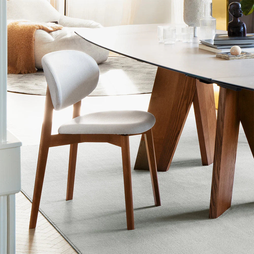 “Close-up of Eide Soft chair by Connubia – elegant fabric finish and ergonomic Italian craftsmanship"
