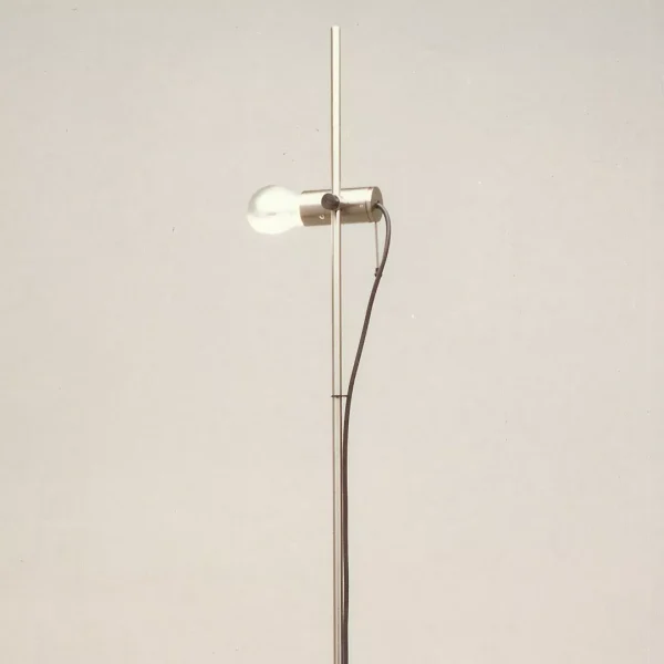 “Agnoli by Oluce modern Italian floor lamp – minimalist spotlight design with adjustable head and sleek chrome stem”
