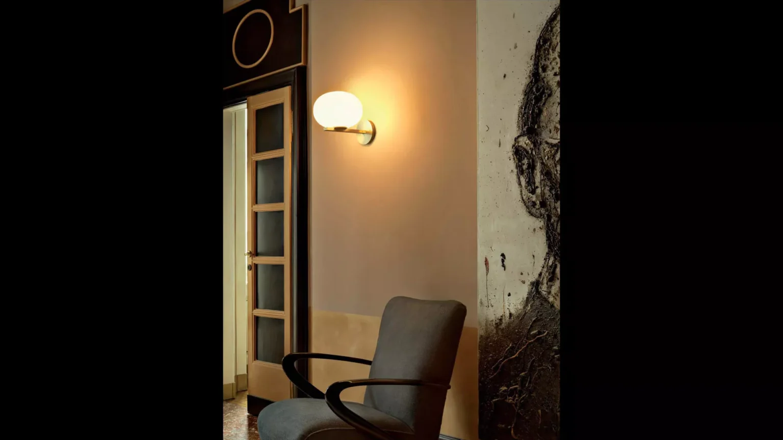 “Alba by Oluce stylish Italian lamp – minimalist table lamp featuring smooth glass shade and sleek metal finish”