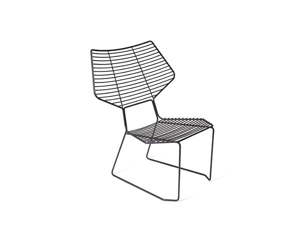 "Alieno Peacock lounge chair by Casamania, designed by GamFratesi, featuring a minimalist embossed metal frame with a sled base, available in black and white finishes."