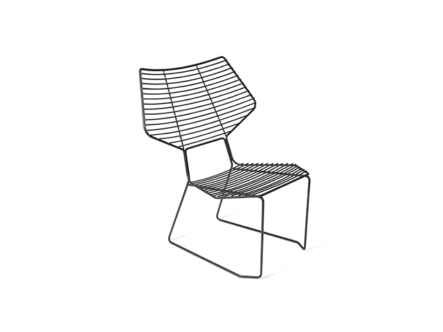 "Alieno Peacock lounge chair by Casamania, designed by GamFratesi, featuring a minimalist embossed metal frame with a sled base, available in black and white finishes."