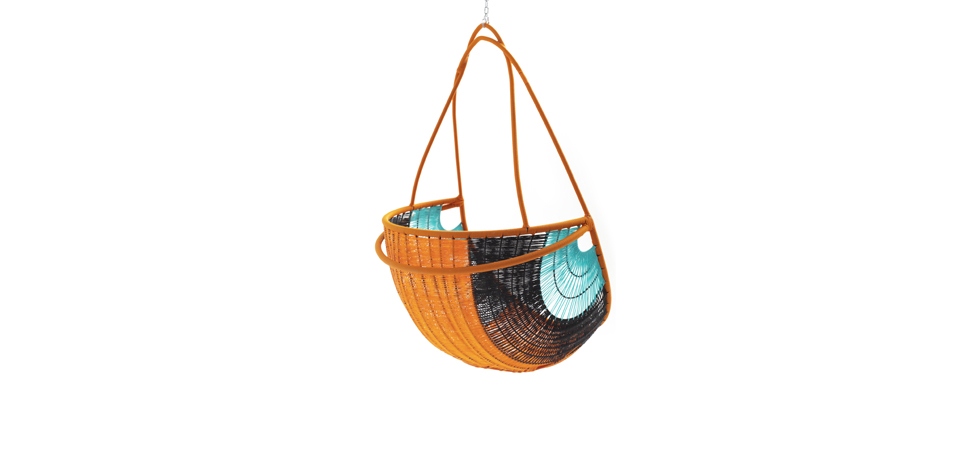 Arch chair by Moroso with curved steel frame and woven polyethylene netting in vibrant multicolor, showcasing artisanal craftsmanship