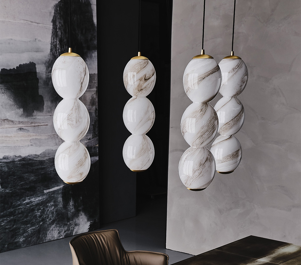 “ZANZIBALL by Cattelan Italia – modern Italian pendant lamp with spherical blown glass shade and elegant suspended design”