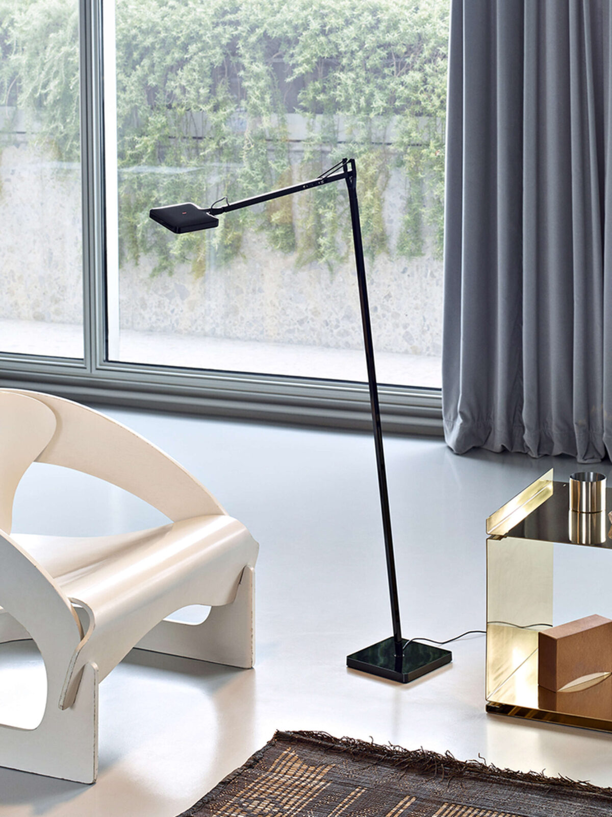 Kelvin LED Floor lamp by Flos showcasing adjustable aluminum arm and directional head at the Michigan Design Center