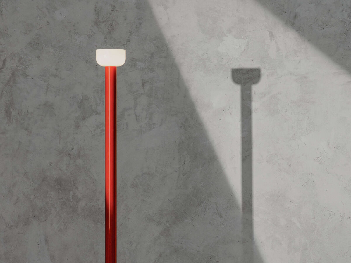 Tall minimalist Bellhop Floor LED lamp featuring a slim painted aluminum column and foot‑switch dimmer cable