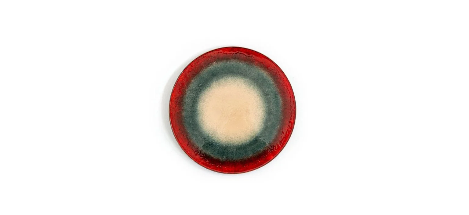 Fire Eater Small Table by Moroso top‐down view illustrating circular enamelled copper surface and wooden base contour at the Michigan Design Center