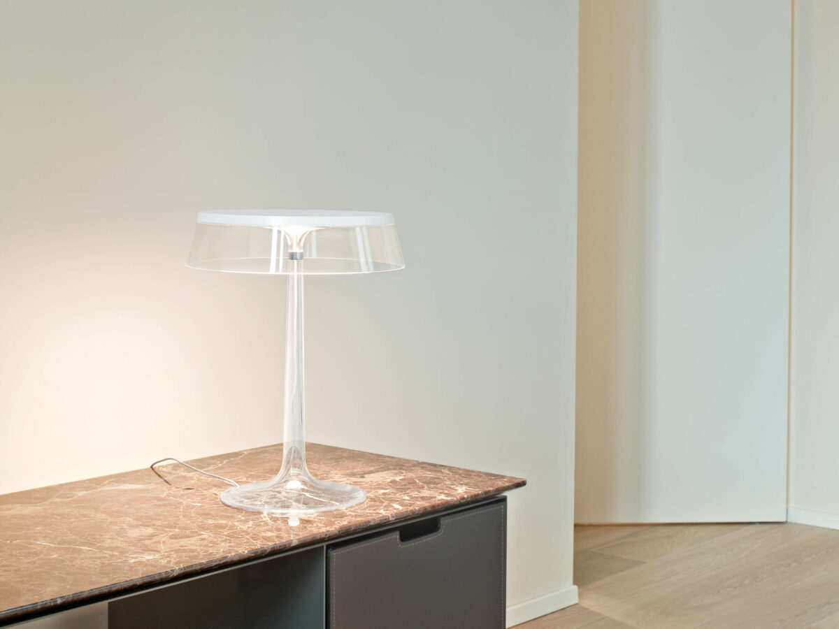 Bon Jour Table Lamp by Flos detail shot of edge‑lighting LED technology and sleek base in a Troy Michigan showroom
