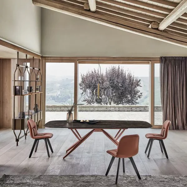 Bridge rectangular table by Bontempi featuring walnut veneer barrel top and contrasting natural‑silver steel base.