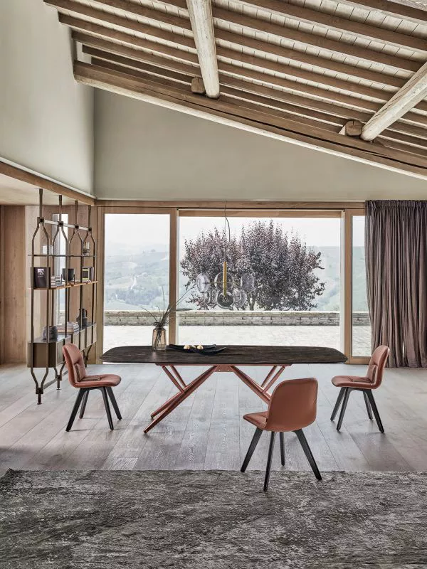 Bridge rectangular table by Bontempi featuring walnut veneer barrel top and contrasting natural‑silver steel base.