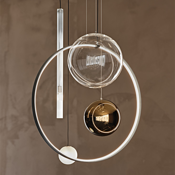 “BIARRITZ by Cattelan Italia – modern Italian side table with round top and sculptural metal base in a luxurious finish”