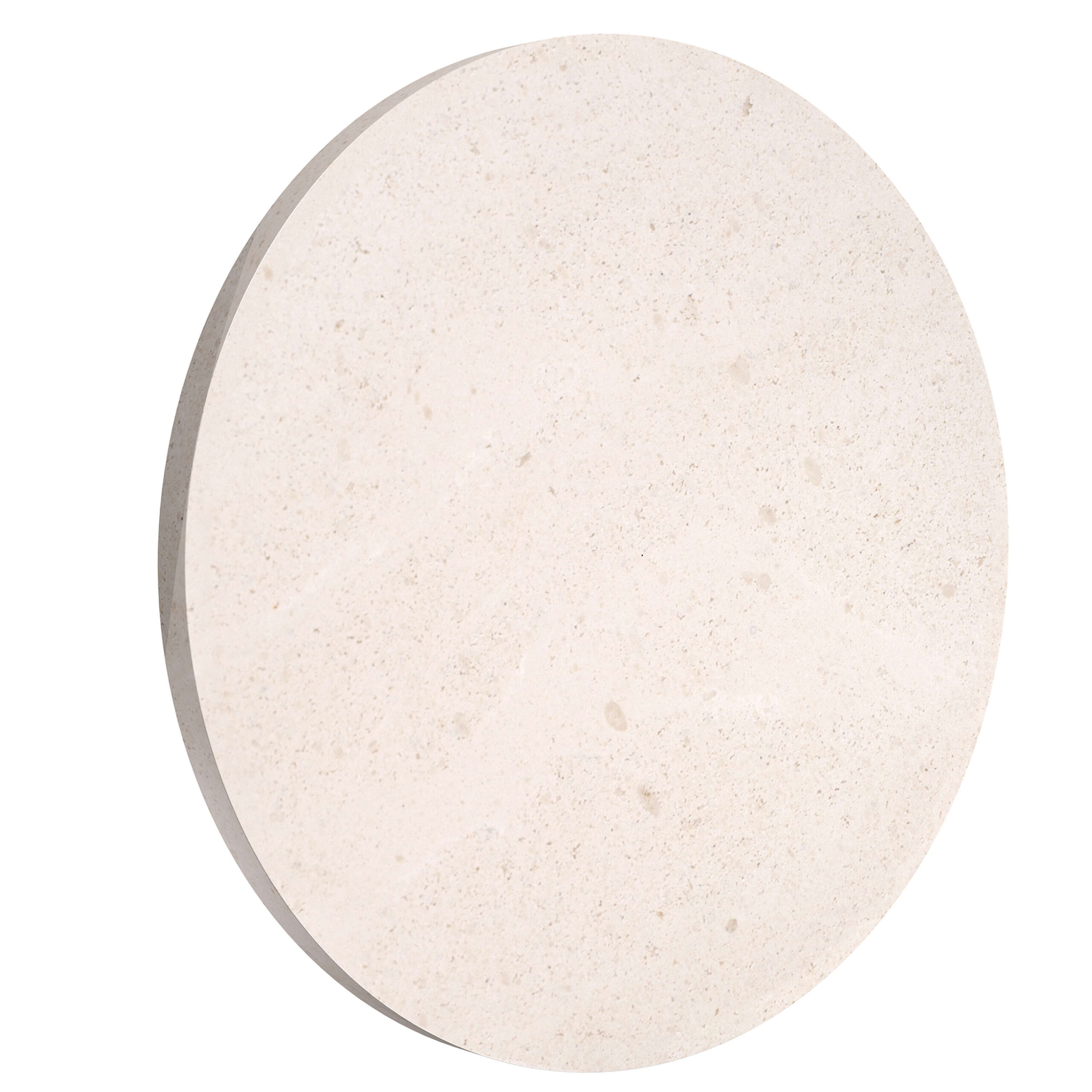 A round Flos Camouflage 240mm outdoor wall lamp made of natural Crema d'Orcia stone, subtly blending into the wall surface while emitting a soft, diffused LED light.