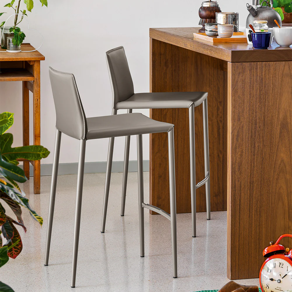 “BOHÈME by Connubia modern Italian chair – upholstered seat with sleek metal frame and elegant stitched backrest”