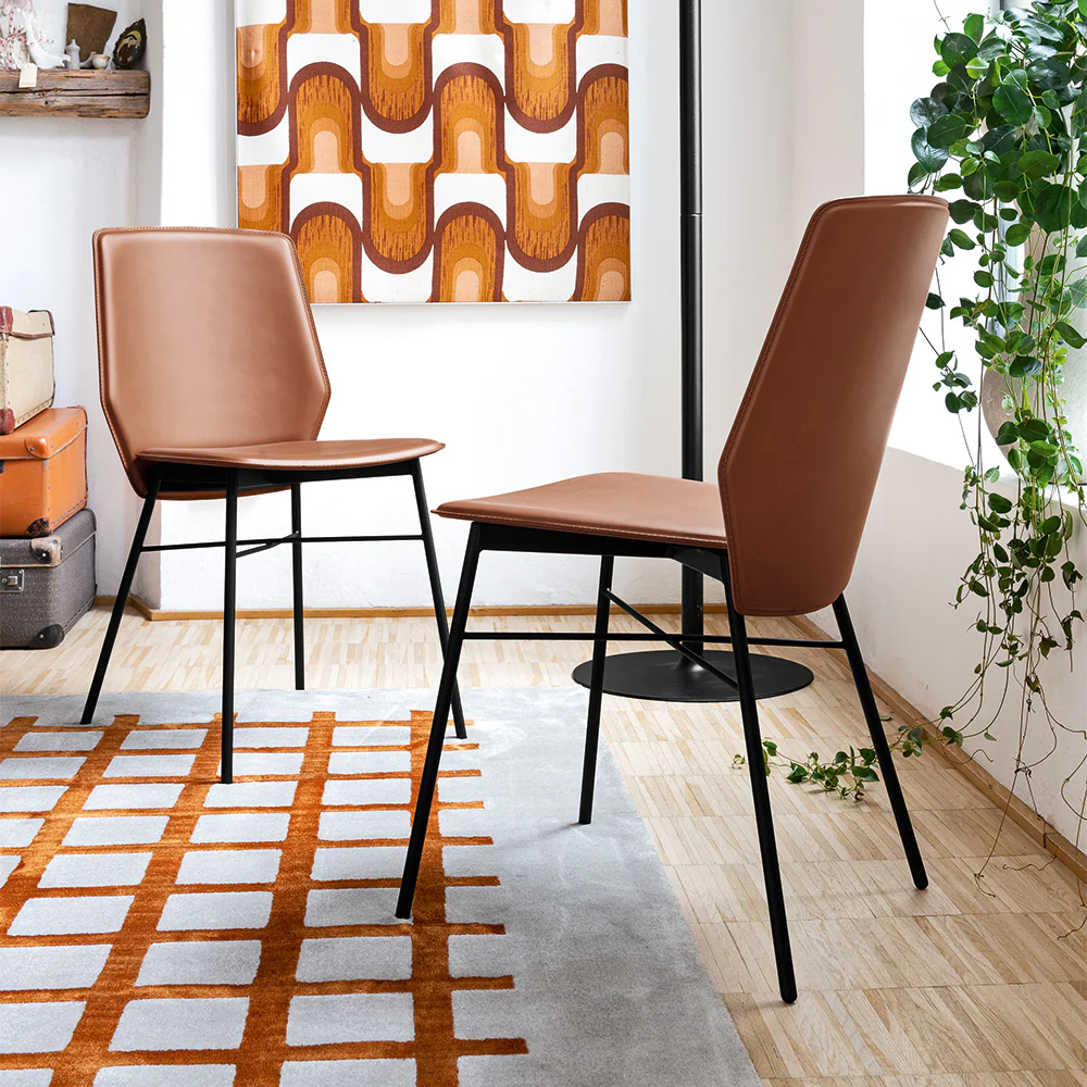 “SIBILLA by Connubia modern Italian chair – curved upholstered seat with sleek metal or wooden legs”