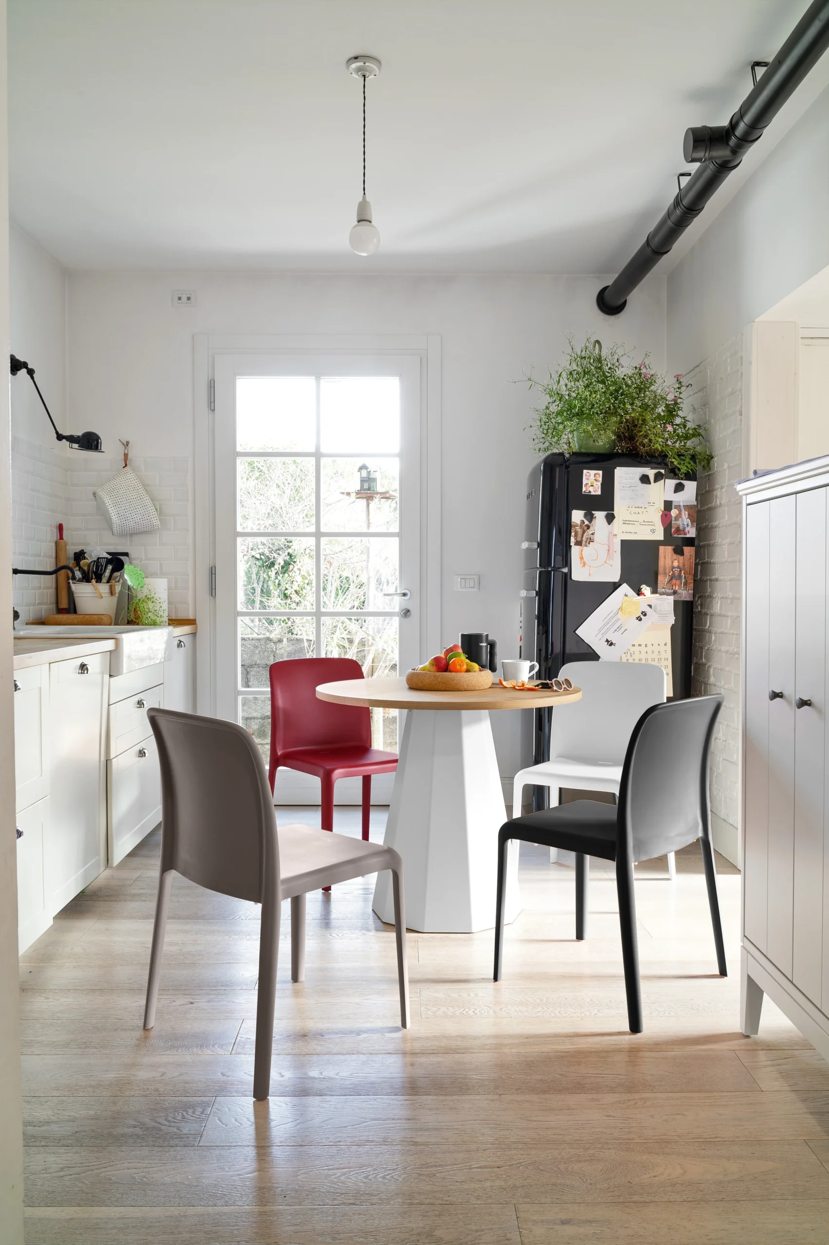 “BAYO by Connubia modern Italian chair – stackable polypropylene seat with clean lines and minimalist silhouette”