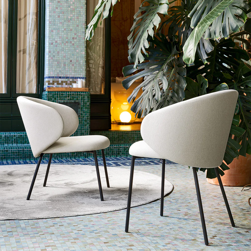 “TUKA by Connubia modern Italian chair – fully upholstered seat with rounded backrest and sleek legs”