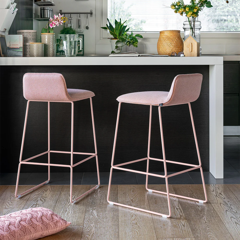 “Side view of RILEY SOFT chair by Connubia – padded modern design offering comfort and style for dining or office spaces”