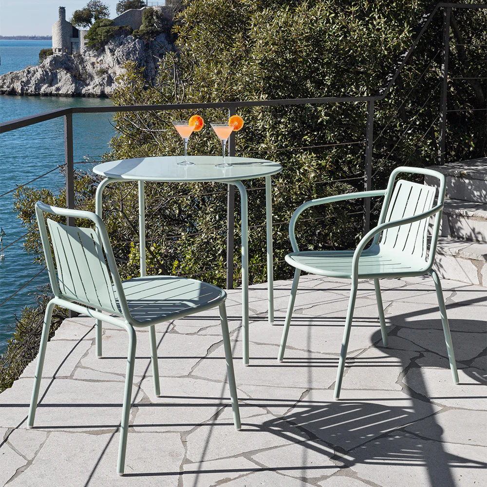 “EASY by Connubia foldable chair – minimalist Italian design with slim metal frame, ideal for compact living spaces”