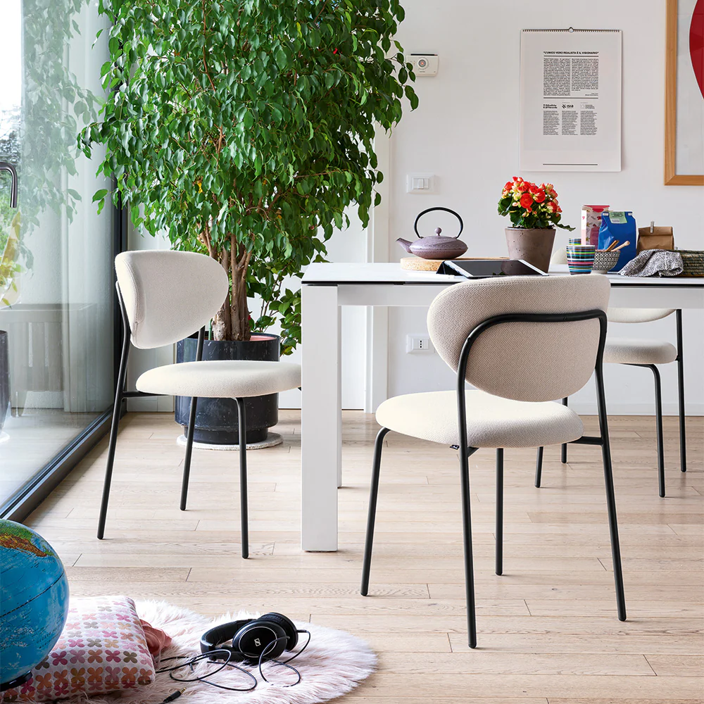 “COZY by Connubia modern Italian chair – plush upholstered seat with soft rounded backrest and slim legs”