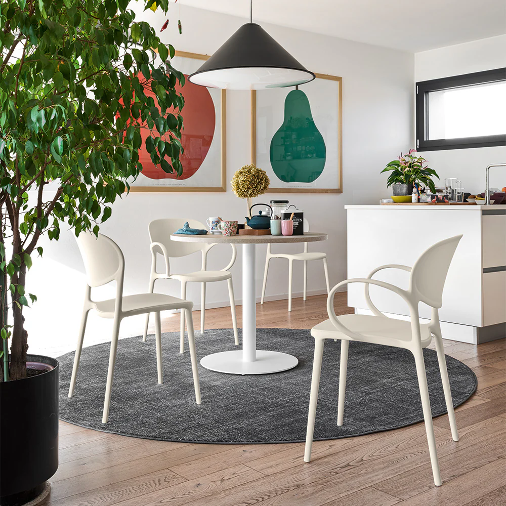 “ABBY by Connubia upholstered dining chair – modern Italian design with curved back and tapered legs”