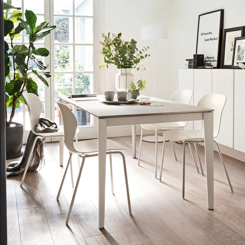 “ARTIC by Connubia modern extendable dining table – sleek rectangular top with minimalist metal legs in Italian design”
