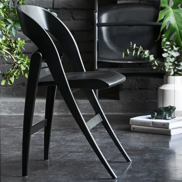 “Top view of CLIKCLAK by Connubia – contemporary table with lift-up surface for smart storage”