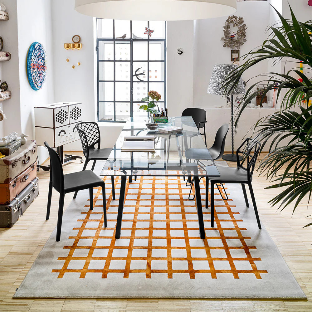 “Side view of CEK table by Connubia – sleek profile with minimalist silhouette and refined materials”