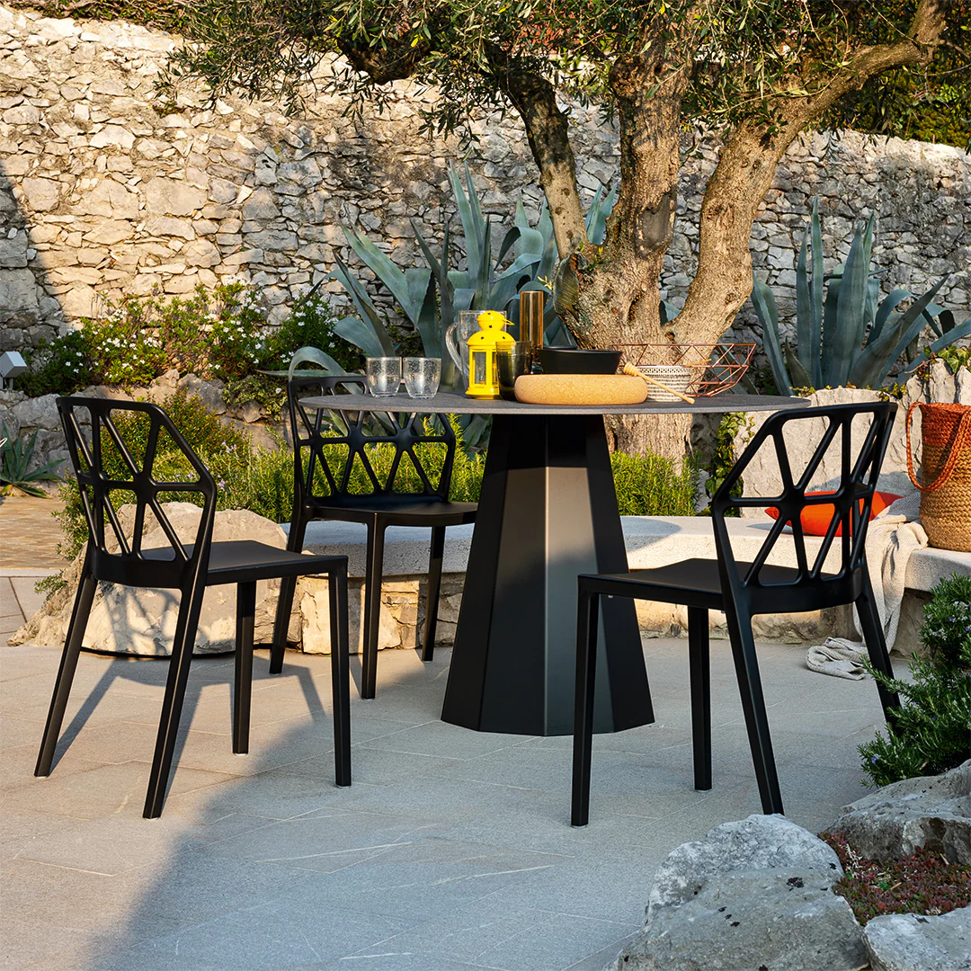 “DIX by Connubia modern round dining table – sleek Italian design with central pedestal base and smooth tabletop”
