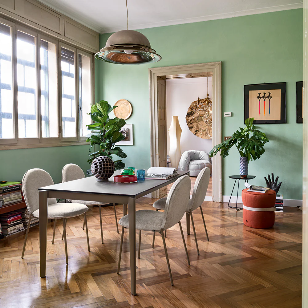 “ARTIC extendable table by Connubia in styled setting – modern Italian table combining practicality with sophisticated aesthetics”