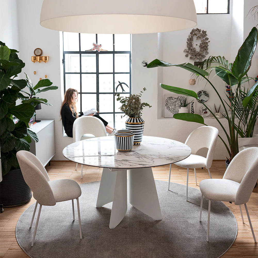 “Front view of ORION chair by Connubia – contemporary padded seat with minimalist lines and elegant silhouette”