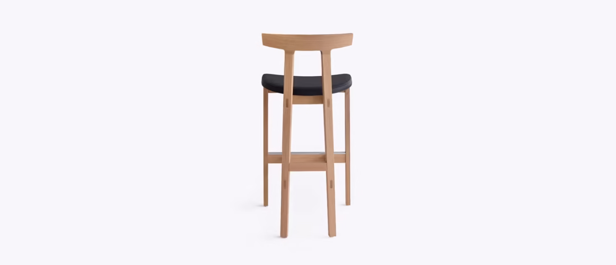 Bensen TORII Stool, featuring a unique, gracefully curved backrest that resembles a traditional Japanese Torii gate, offering ergonomic support.