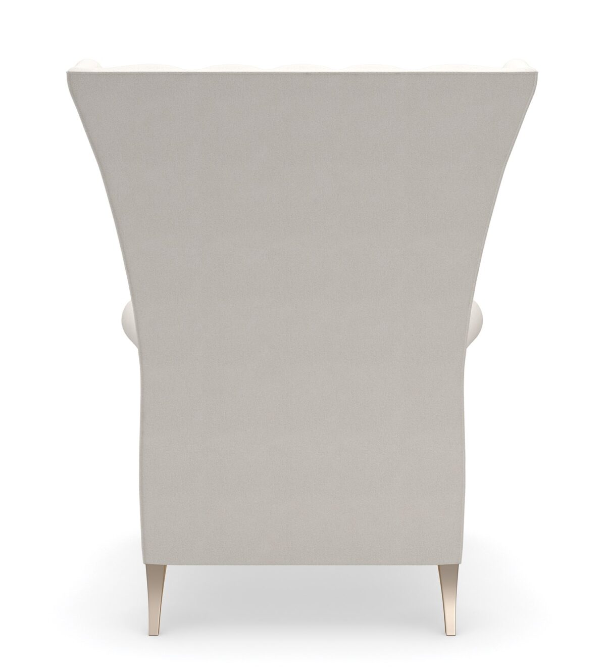 The Caracole Valentina Accent Chair, a sophisticated wing chair with a tall channel-tufted back, wood-trimmed roll arms, upholstered in a light cream pin-dot fabric, and featuring exposed wood details in a Golden Shimmer finish.