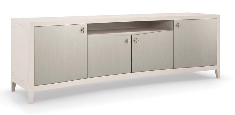 The Full of Charm Media Console by Caracole features a Matte Pearl finish, Silver Charm door fronts, pinstriped end panels, and ample storage.