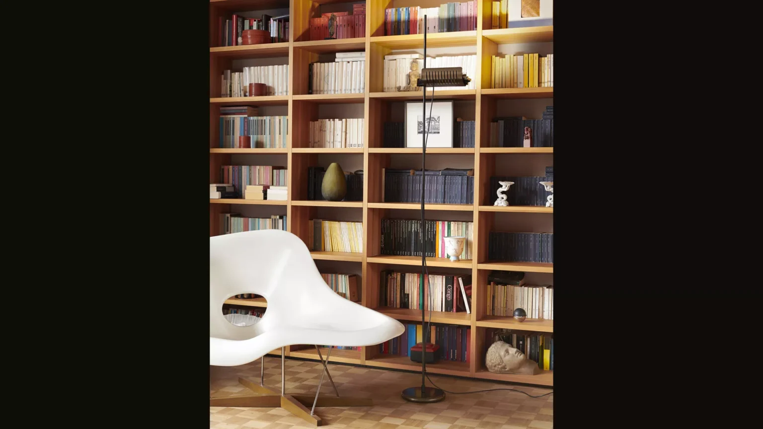 “Colombo by Oluce luxury modern lighting – architectural LED floor lamp with polished metal finish and geometric form”