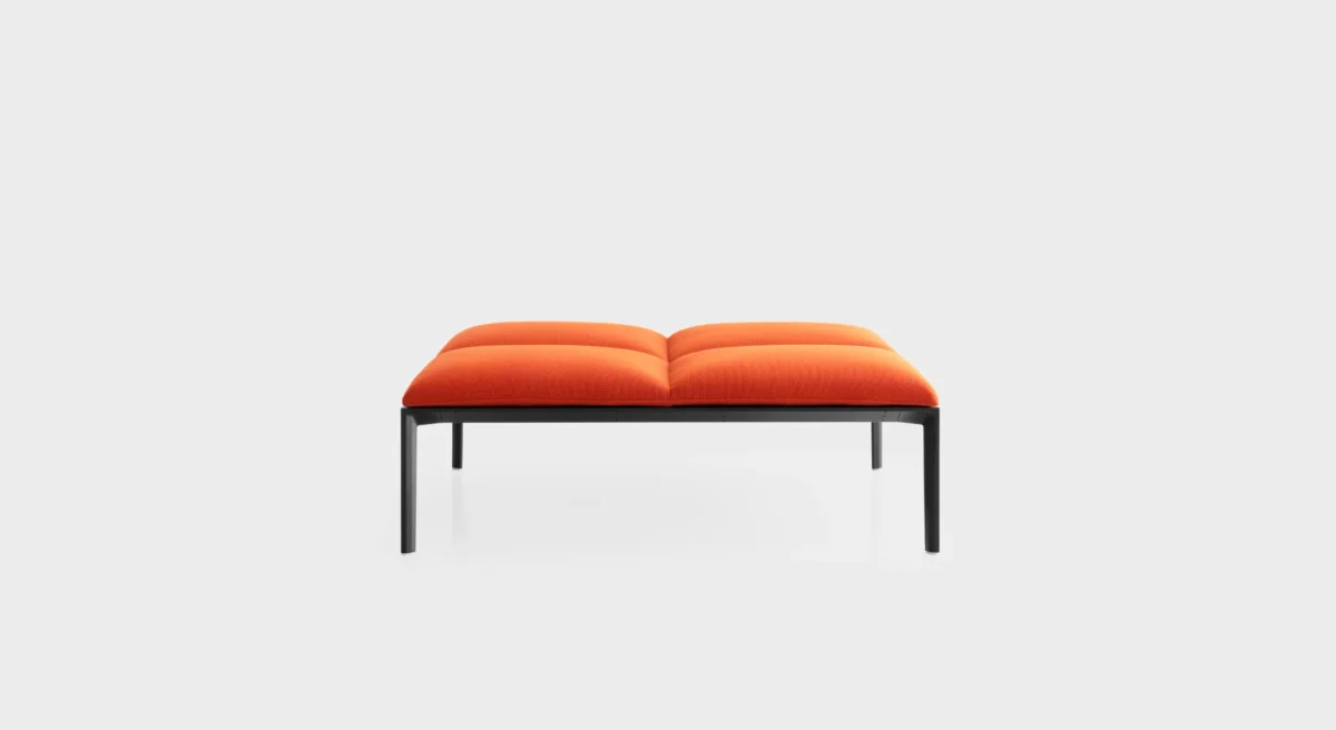 Minimalist bench with slim metal legs and wood seat by Lapalma.