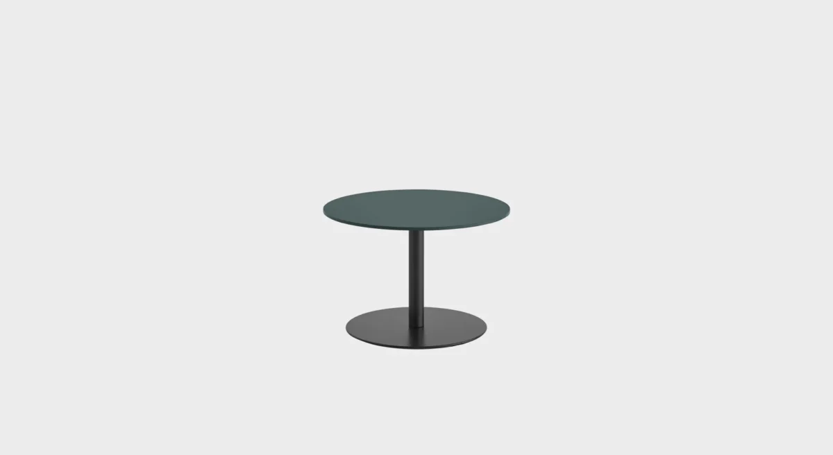 “Lapalma H40 table in matte black finish, positioned beside a lounge chair, perfect for modern interiors.”