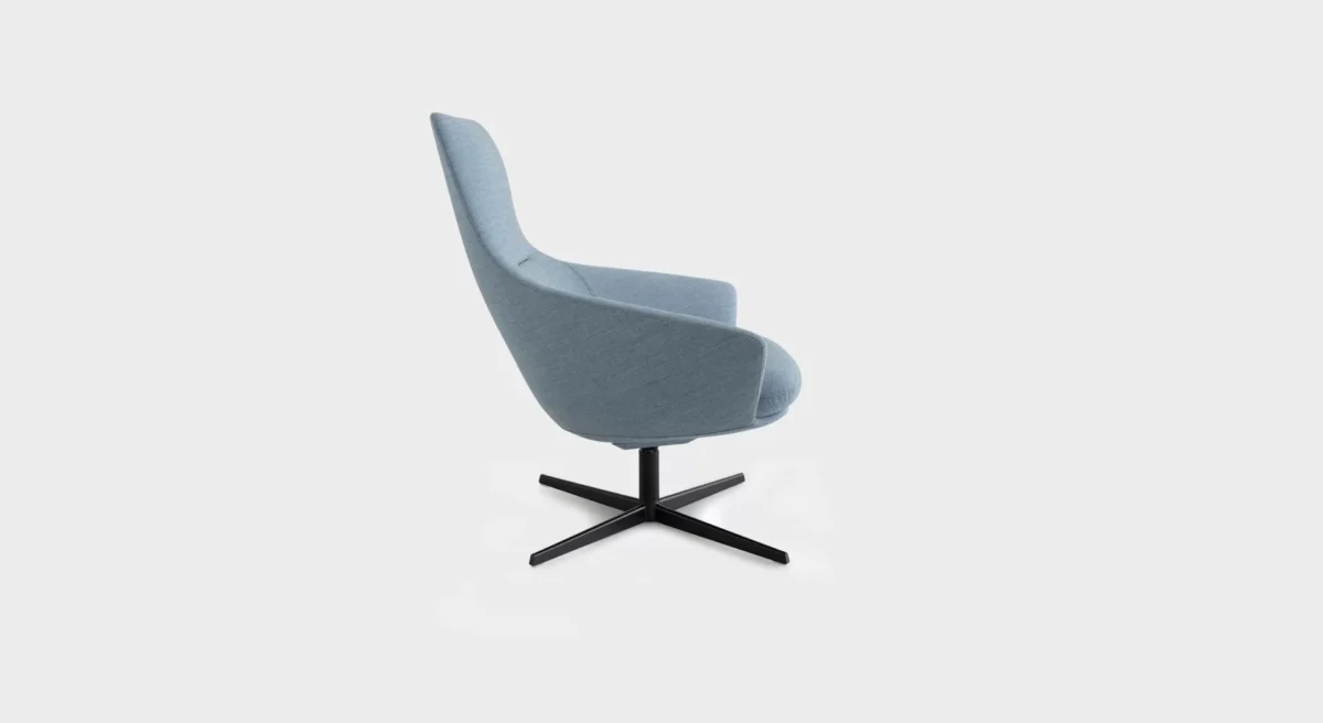 “Lapalma Edit S570 armchair with rigid polyurethane Baydur® shell, upholstered in soft grey fabric, and solid ash wood legs in natural finish.”
