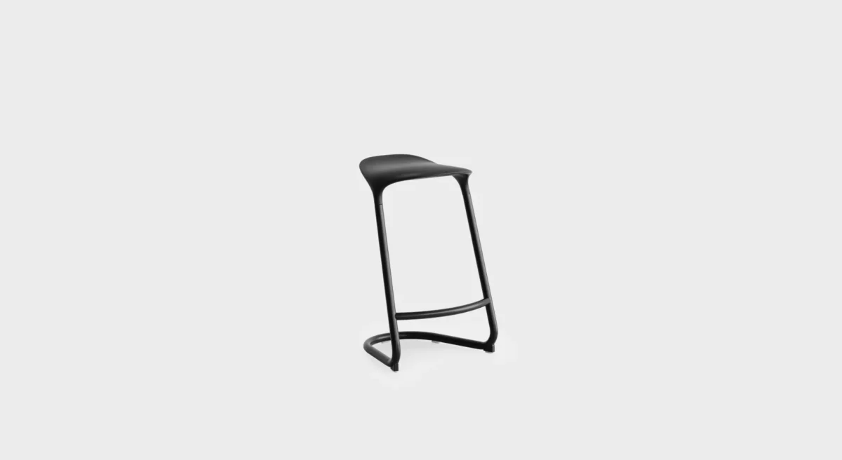 “Lapalma S451 lounge chair with gently curved shell and slender powder‑coated steel legs, showcasing minimalist Italian design.”
