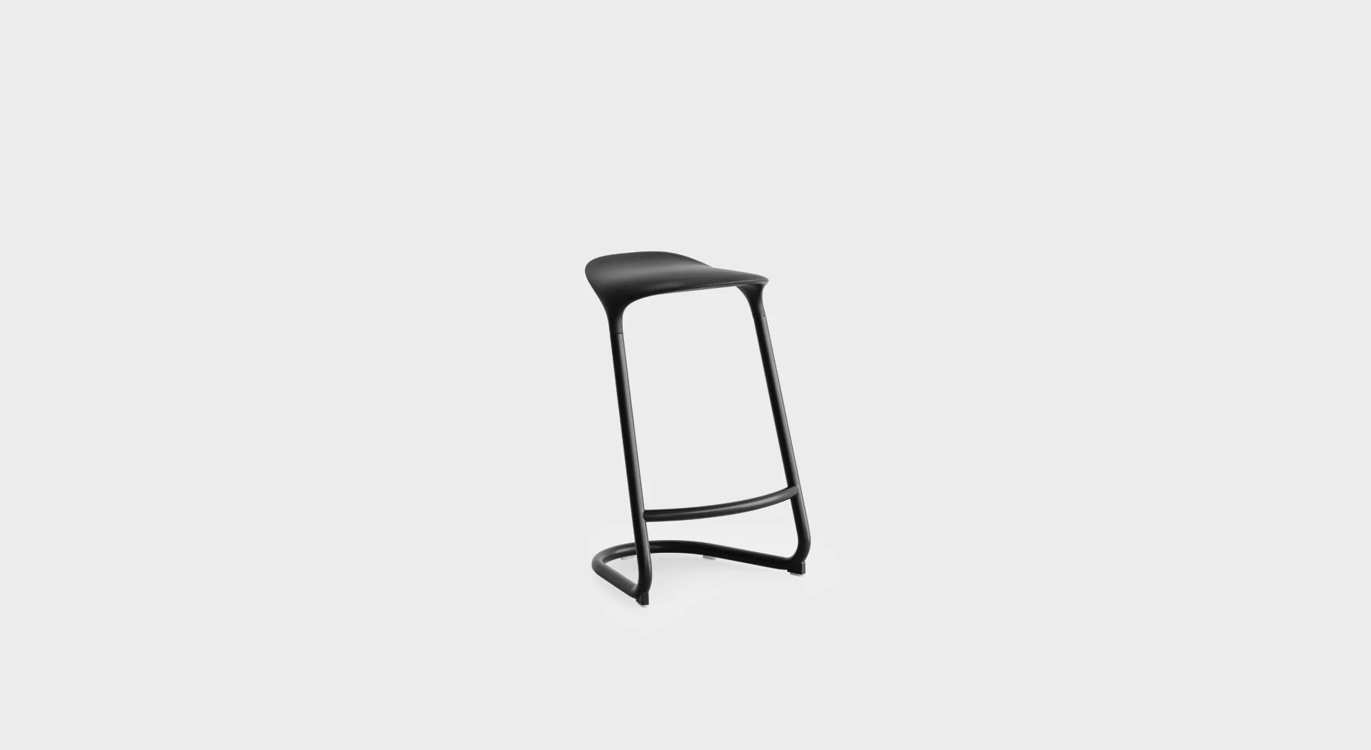 “Lapalma S451 lounge chair with gently curved shell and slender powder‑coated steel legs, showcasing minimalist Italian design.”