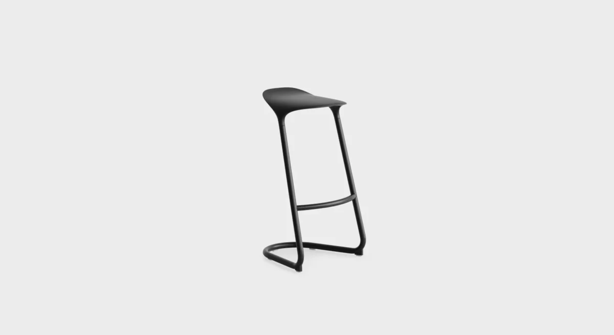 “Lapalma Cross S452 stool in a contemporary office environment, complementing a minimalist desk setup.”