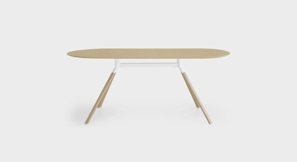 Lapalma Fork P127 H74 table with elliptical aluminum base and wooden legs, featuring a birch plywood top with oak veneer in natural finish.