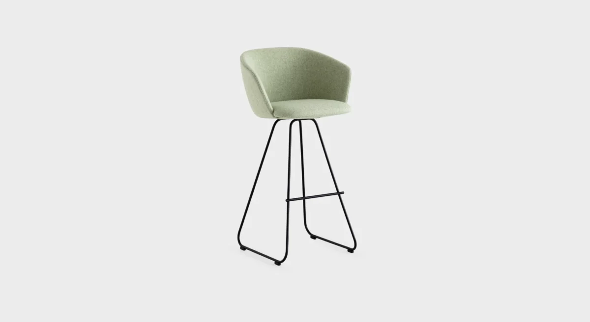 “Lapalma Glove S473 bar stool with high backrest and sled base, upholstered in soft grey fabric, placed in a modern kitchen setting.”