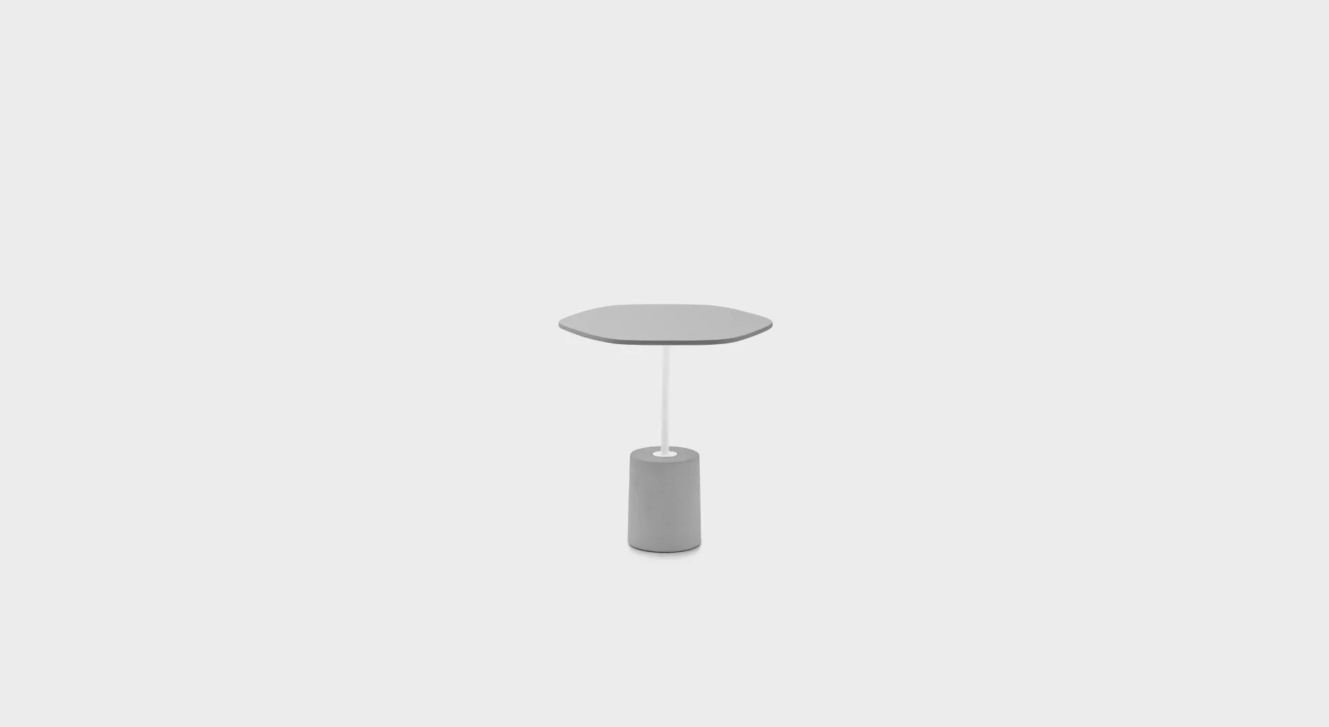 Lapalma JEY ET40 outdoor side table with cylindrical concrete base and powder-coated stainless steel stem, featuring an HPL Fenix® top in sleek black.