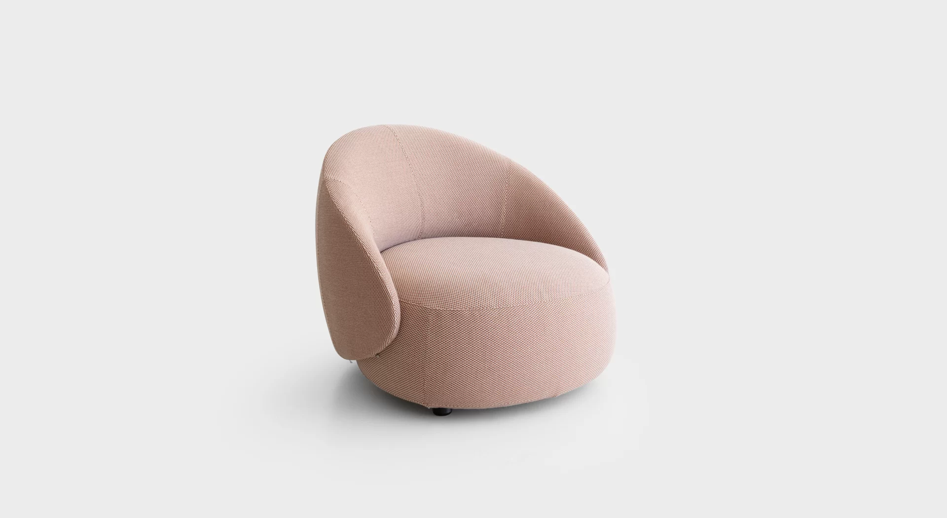 “Lapalma Club D07 pouf with rounded triangular shape, upholstered in soft grey fabric, positioned in a modern lounge area.”