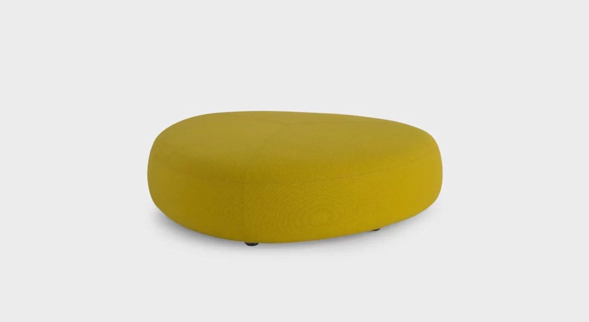“D03 chair in light fabric upholstery and black metal legs, set in a minimalist living room.”