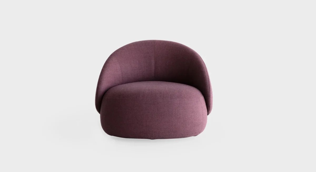 “Lapalma Club D08 armchair in deep burgundy fabric, positioned in a minimalist living room setting, emphasizing its clean lines and comfort.”
