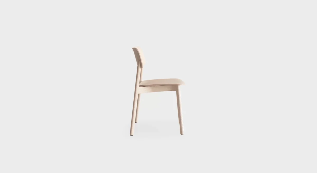 Lapalma Oiva S370 stackable chair with solid ash frame and curved plywood seat and backrest, designed by Antti Kotilainen.