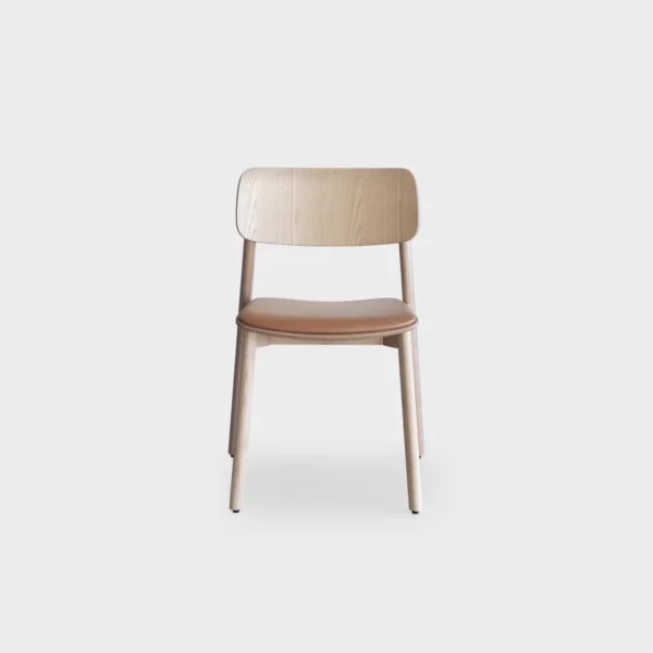 Lapalma Oiva S371 stackable wooden chair with solid ash frame, curved plywood backrest, and upholstered seat pad in fabric or leather.